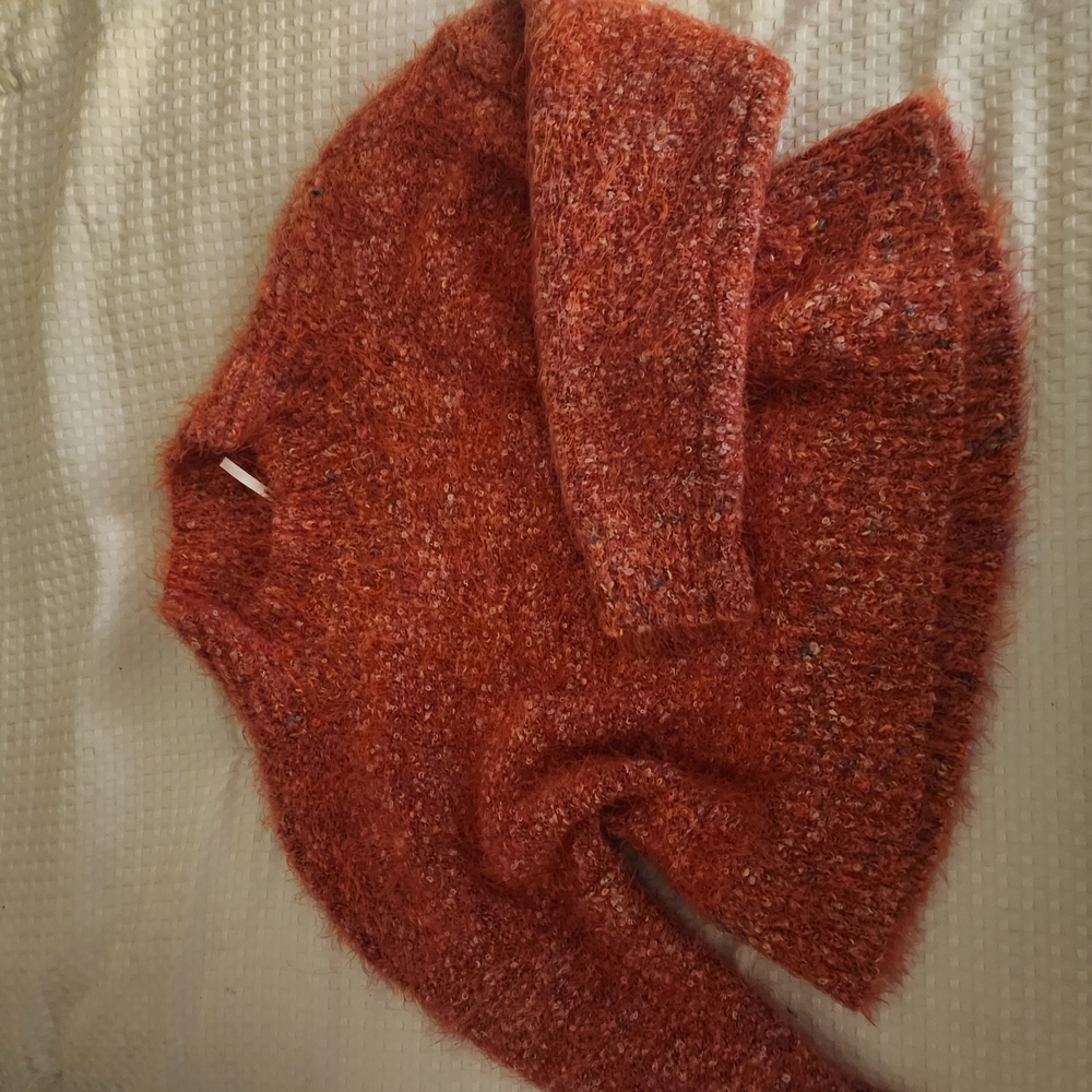 Cozy Women's Free People Sweater in Vibrant Orange